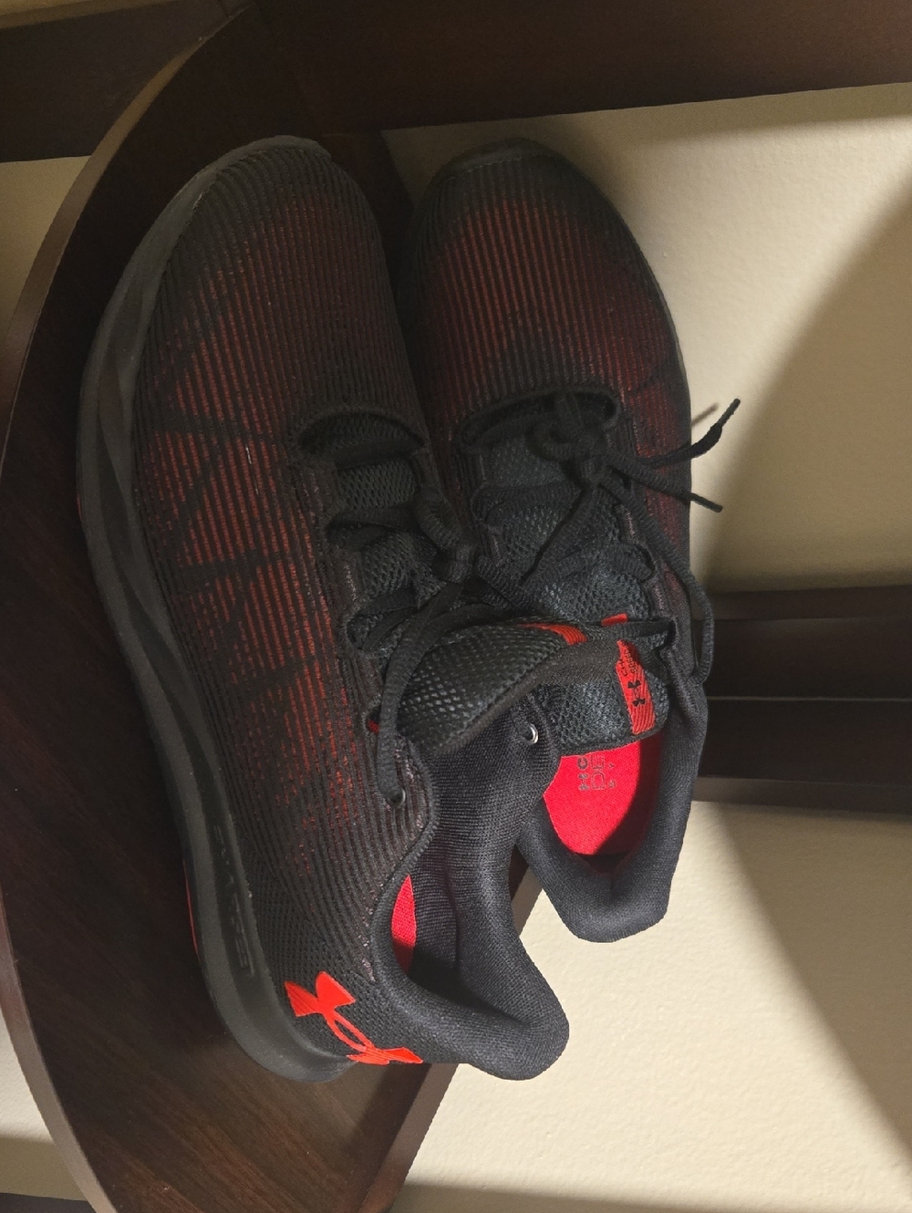 Under Armour Men’s Black with Red Sneakers